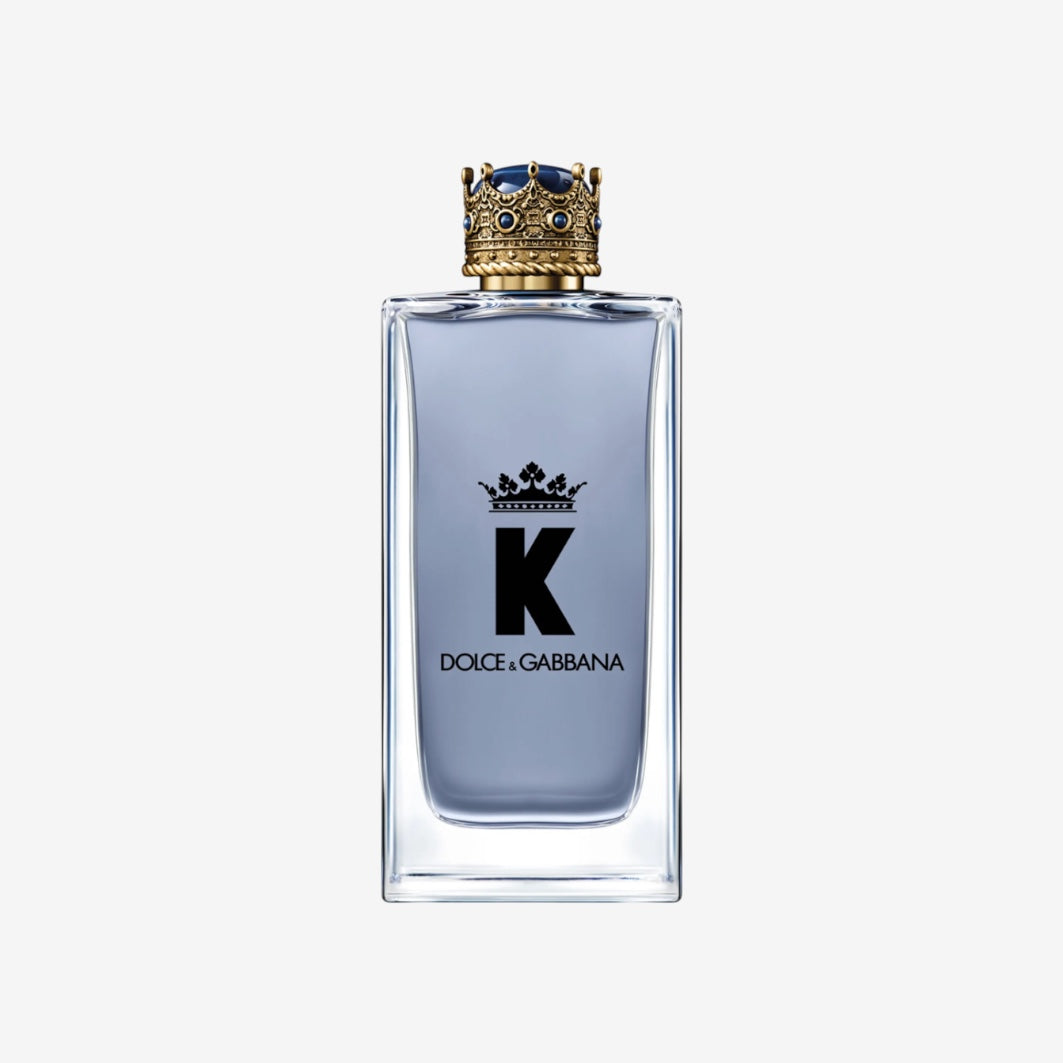 Dolce & Gabbana K Eau de Toilette 100ml, a fresh aromatic fragrance in a clear glass bottle with a crown-shaped cap.