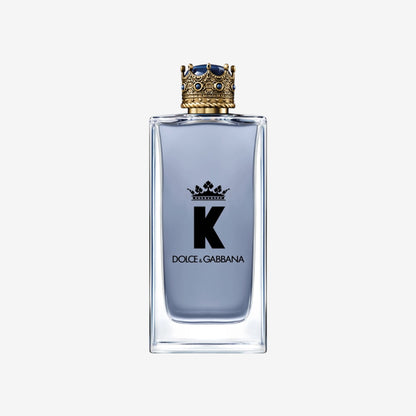 Dolce & Gabbana K Eau de Toilette 100ml, a fresh aromatic fragrance in a clear glass bottle with a crown-shaped cap.